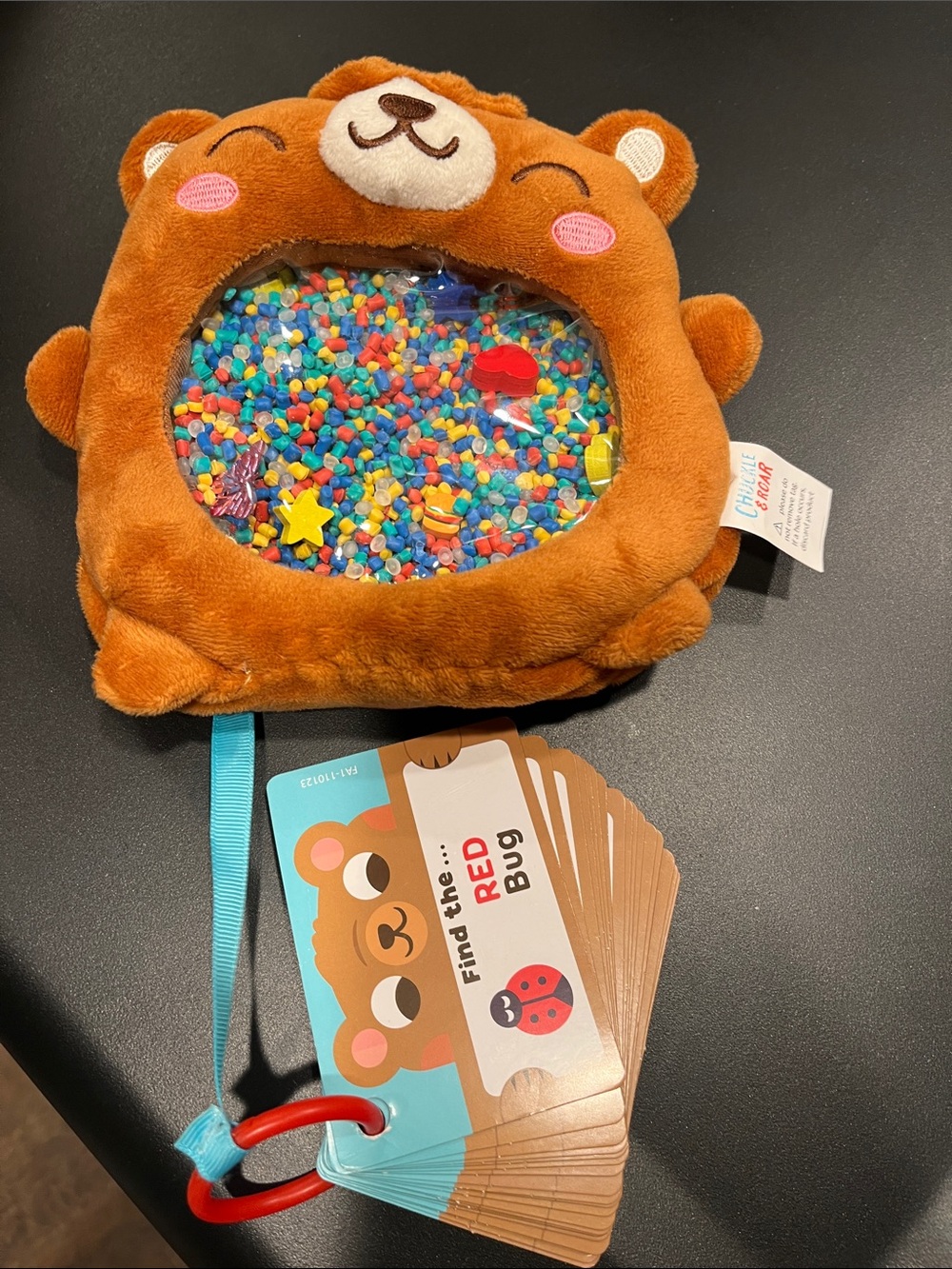 Chuckle and roar sensory seek and find plush bear game
